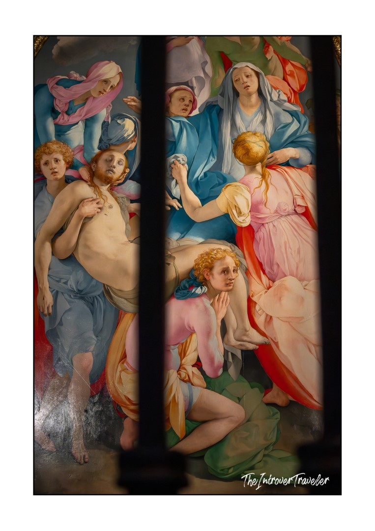 Pontormo's Deposition from the Cross, vivid Mannerist figures in pink and blue mourning Christ