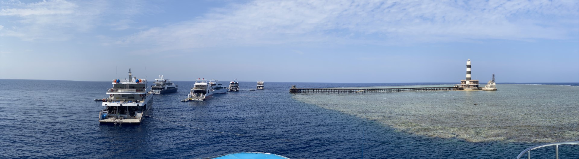 Multiple Red Sea liveaboard dive boats anchored near Daedalus Reef