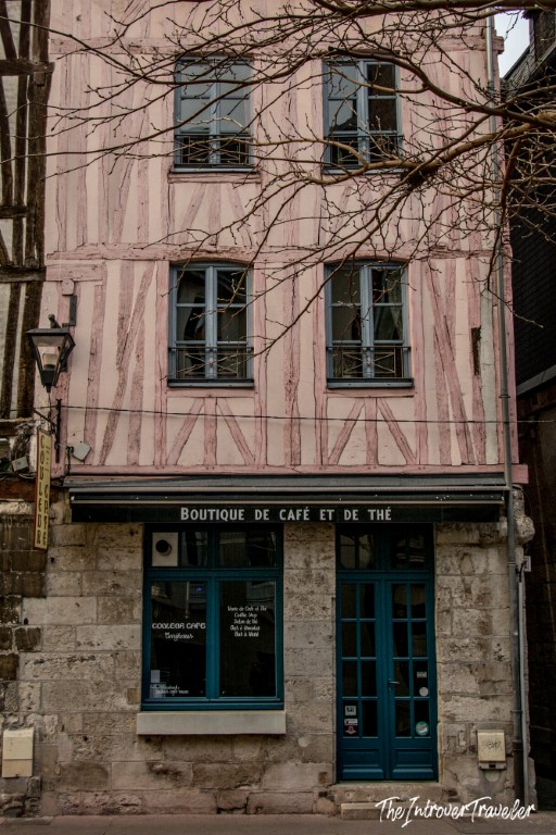 Pink half-timbered building housing a boutique cafe and tea shop in Rouen, Normandy