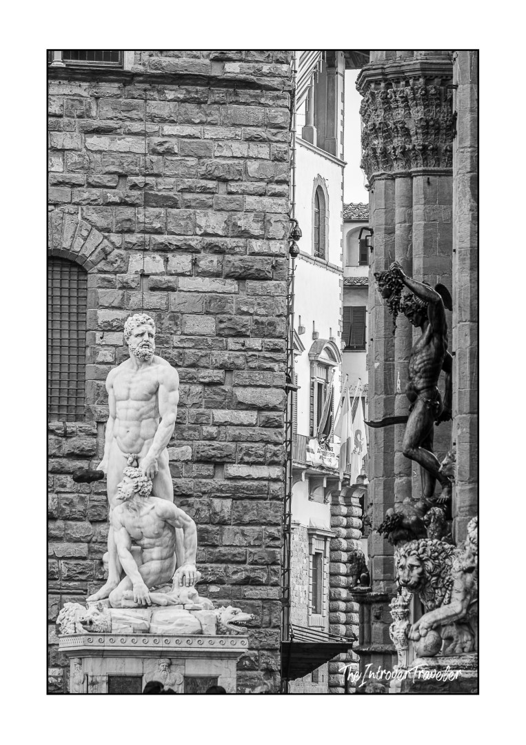 Cellini's Perseus with bronze figure beside Hercules and Cacus, Piazza della Signoria Florence