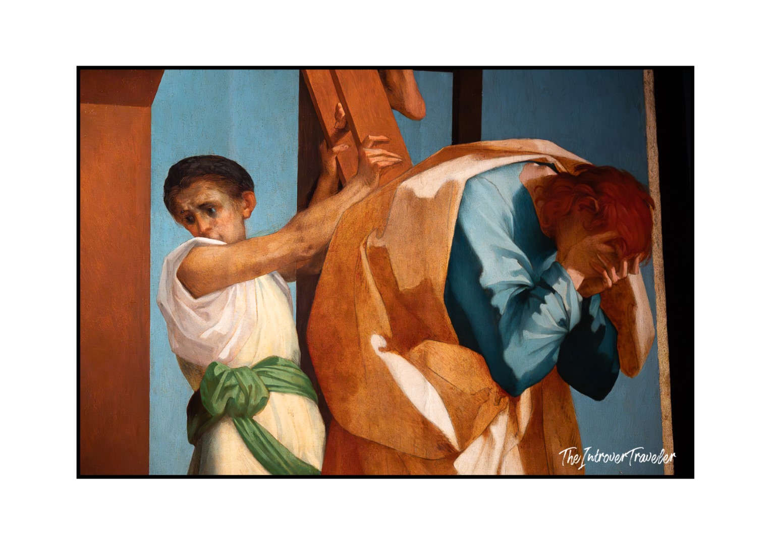 Close-up detail of Rosso Fiorentino's Deposition, showing two figures bearing the cross with grief and tension.
