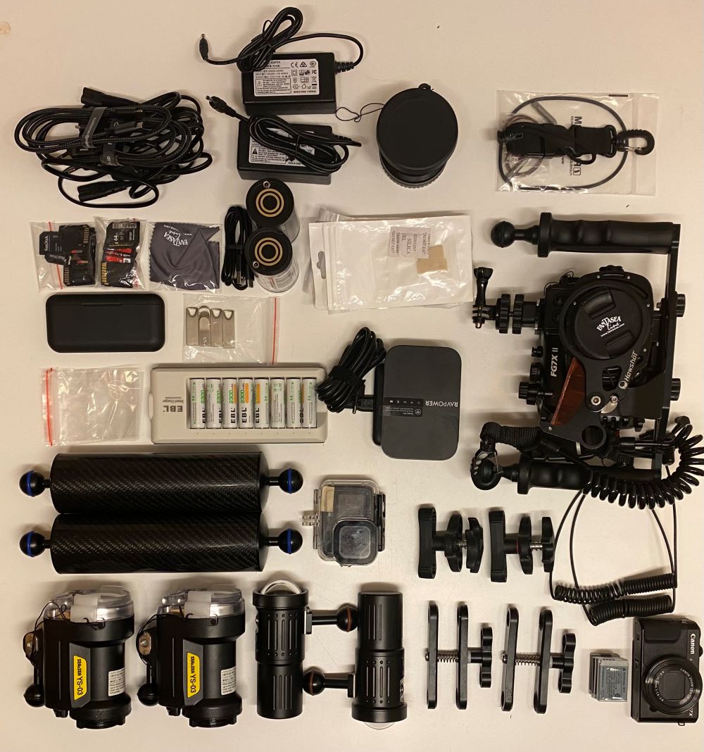 Fantasea FG7X II underwater camera housing with strobes, arms, and accessories laid flat