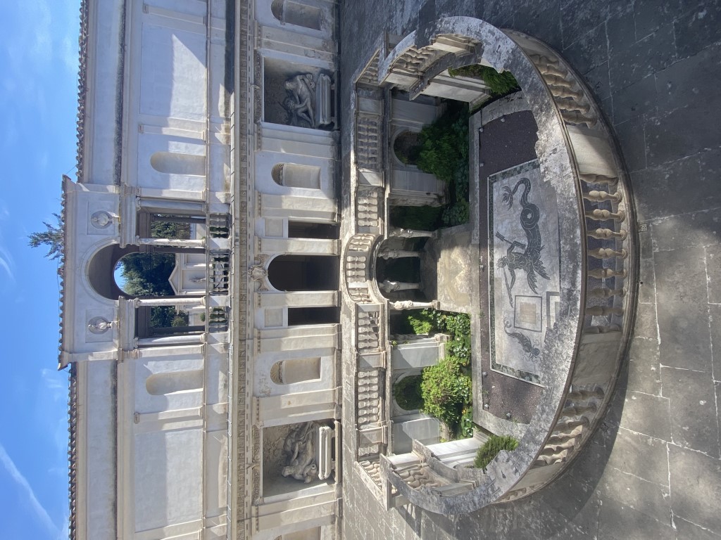 Sunken nymphaeum courtyard of Villa Giulia, Rome, with mosaic floor and Renaissance facade niches