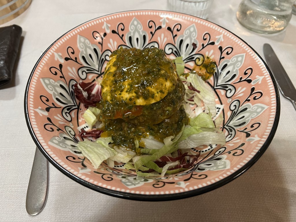 Eggplant and burrata tower with basil sauce at Trattoria Casa Mia, Bologna
