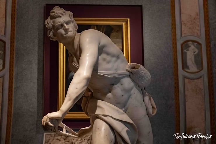 Bernini's David at Borghese Gallery, Rome, captured mid-sling in dynamic twisting marble pose
