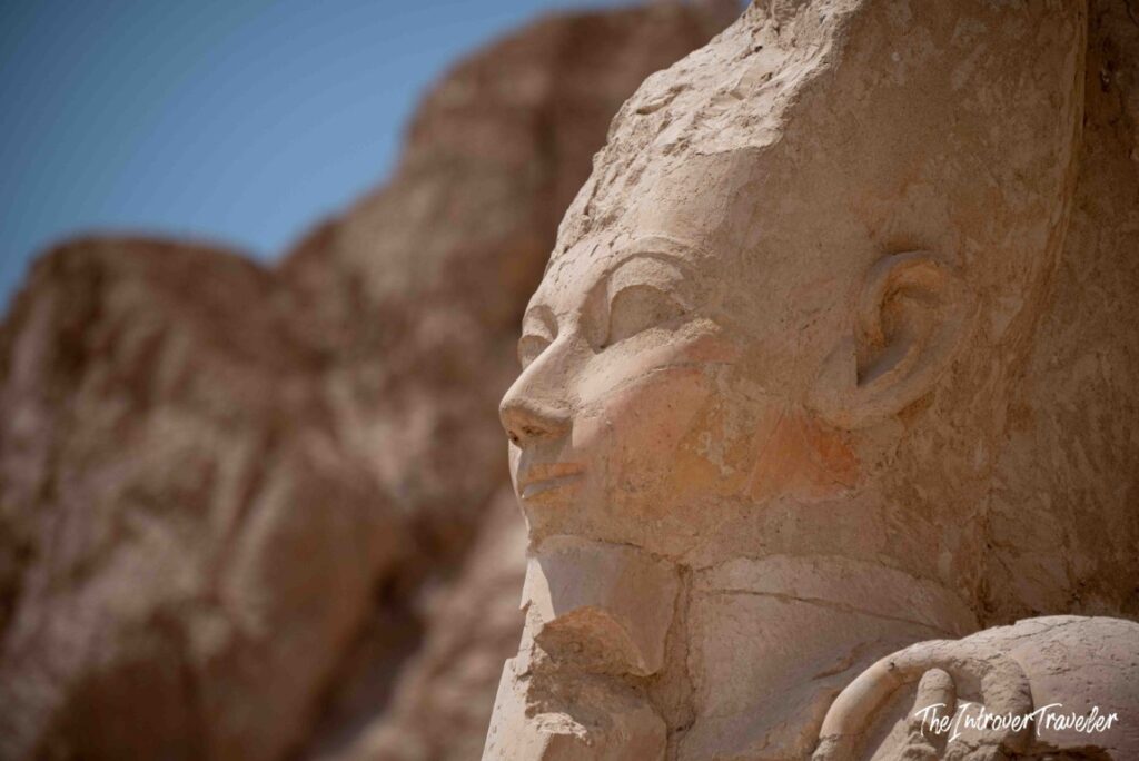Close-up of a sandstone statue of Hatshepsut at her mortuary temple in Deir el-Bahari, Egypt