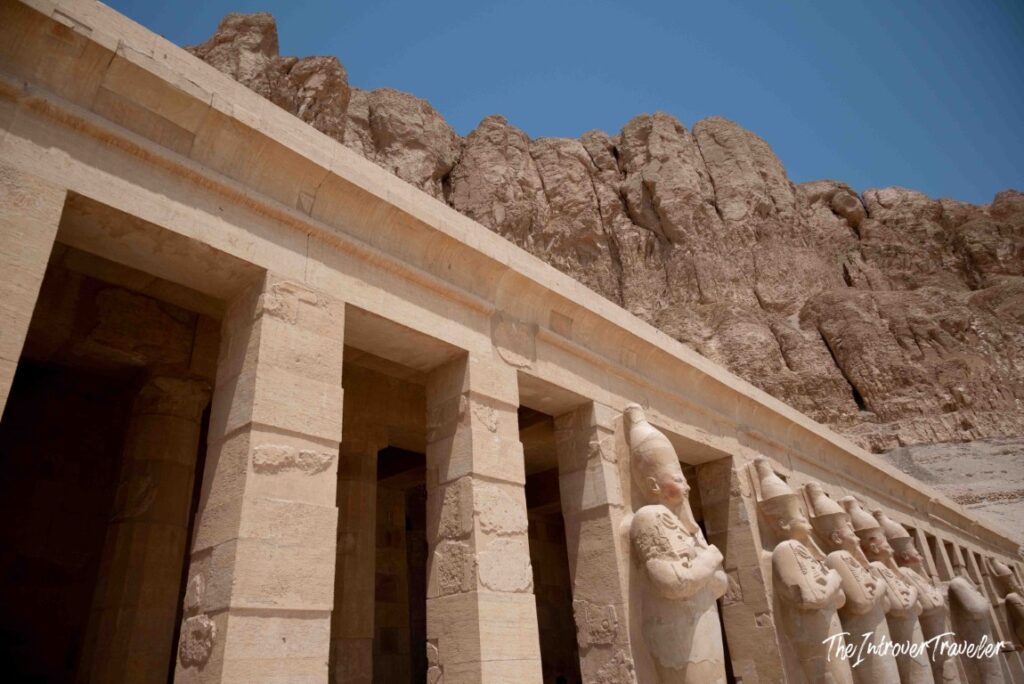 Osiride statues lining the upper colonnade of the Temple of Hatshepsut, Luxor, Egypt