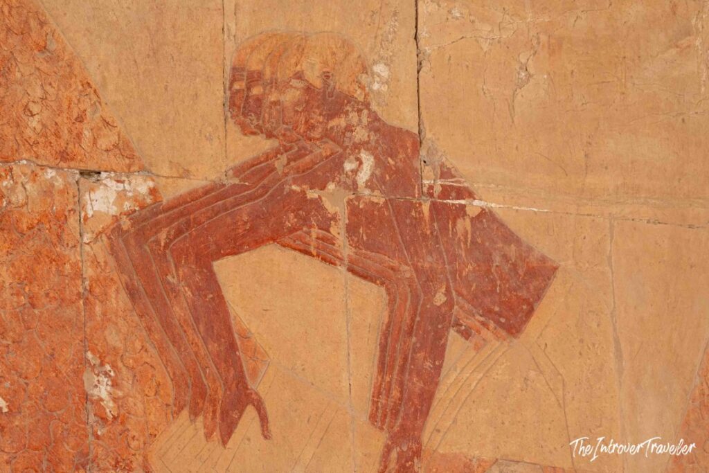 Ancient Egyptian wall painting of a human figure at the Temple of Hatshepsut, Deir el-Bahari