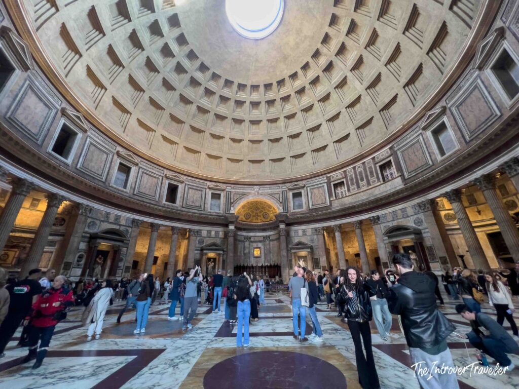 Visitors under the dome of the Pantheon, Rome
