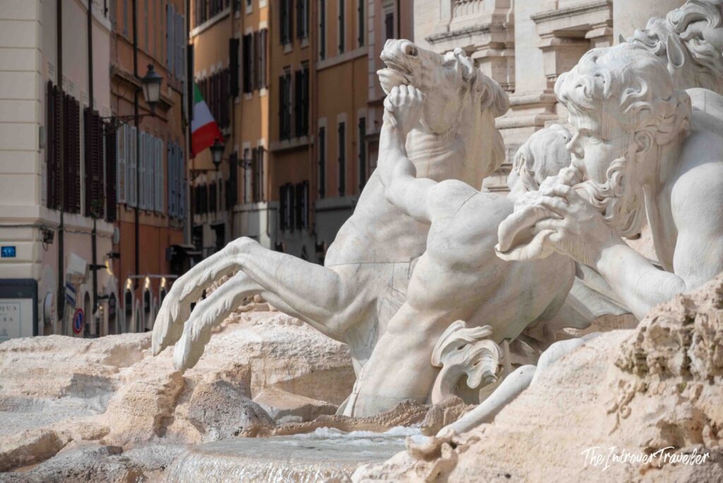 Rearing sea horse and triton, the stormy sea, Trevi Fountain, Rome
