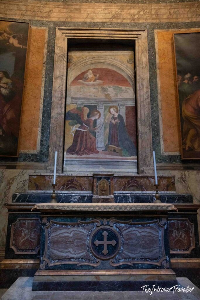 Annunciation fresco attributed to Antoniazzo Romano above a marble altar, Pantheon, Rome