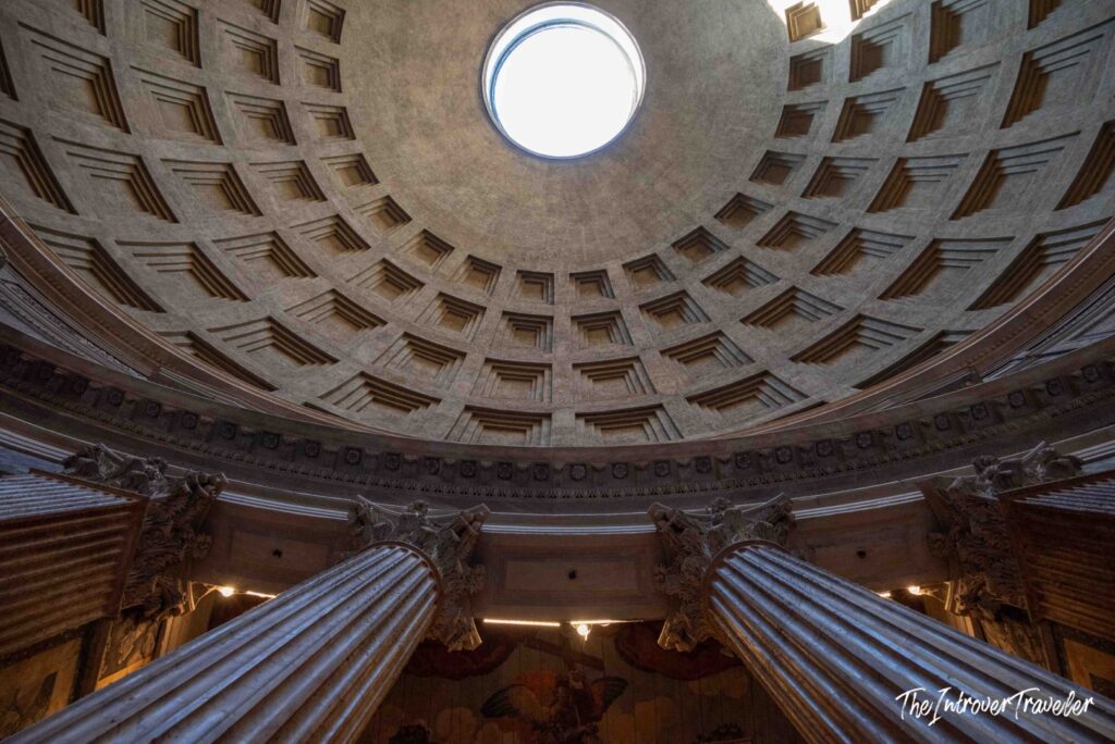 Pantheon dome seen from directly below, with the oculus and a disc of sunlight on the coffers, Rome