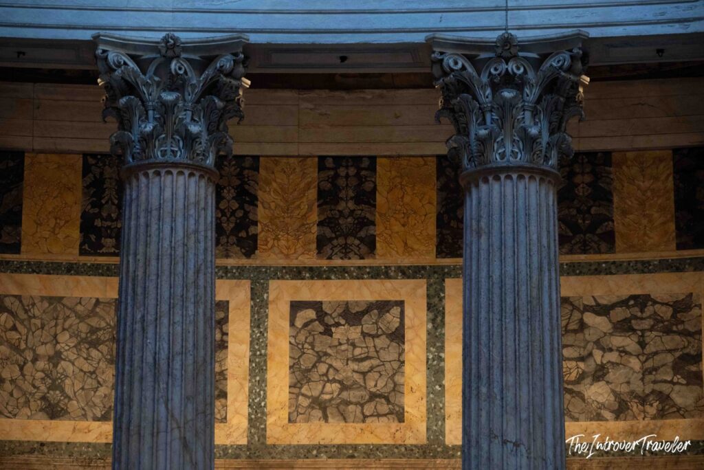Corinthian columns and coloured marble wall panels inside the Pantheon, Rome